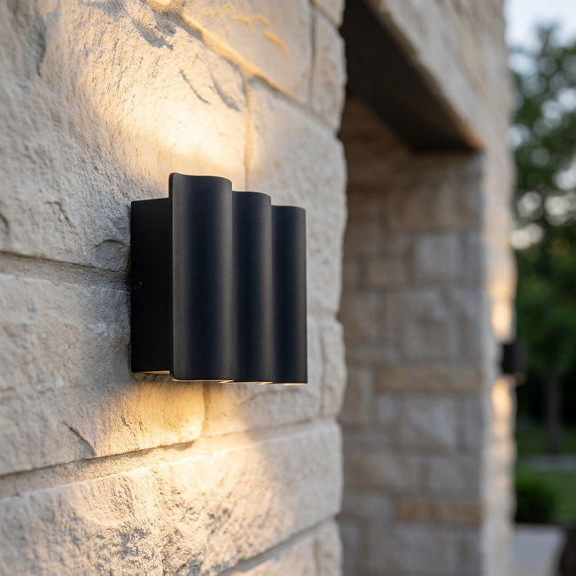 Close detail of the Verano wall light on stone