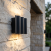 Close detail of the Verano wall light on stone