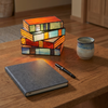 Novella book lamp on a desk from above