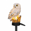 Wynn solar owl garden light on a white background