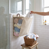 Wallora Foldable Wall Mounted Laundry Basket in use