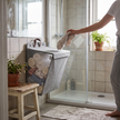 Wallora Foldable Wall Mounted Laundry Basket in use